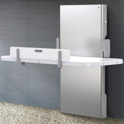Bradley 9989-000000 Universal Changing Table – Stainless Steel, Surface/Floor Mounted, Auto-Retracting Safety Feature